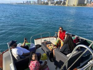 Guests enjoying the views of Waikiki aboard the Kona Star, Ocean Adventures Hawaii