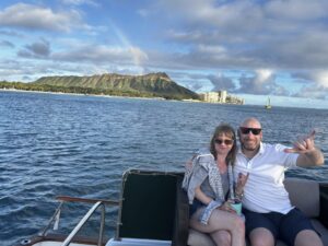 Guests enjoying the views of Diamond Head aboard the Kona Star, Ocean Adventures Hawaii