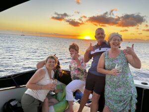 Guests enjoying the views of the Sunset aboard the Kona Star, Ocean Adventures Hawaii