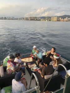 Guests enjoying the views of Waikiki aboard the Kona Star, Ocean Adventures Hawaii
